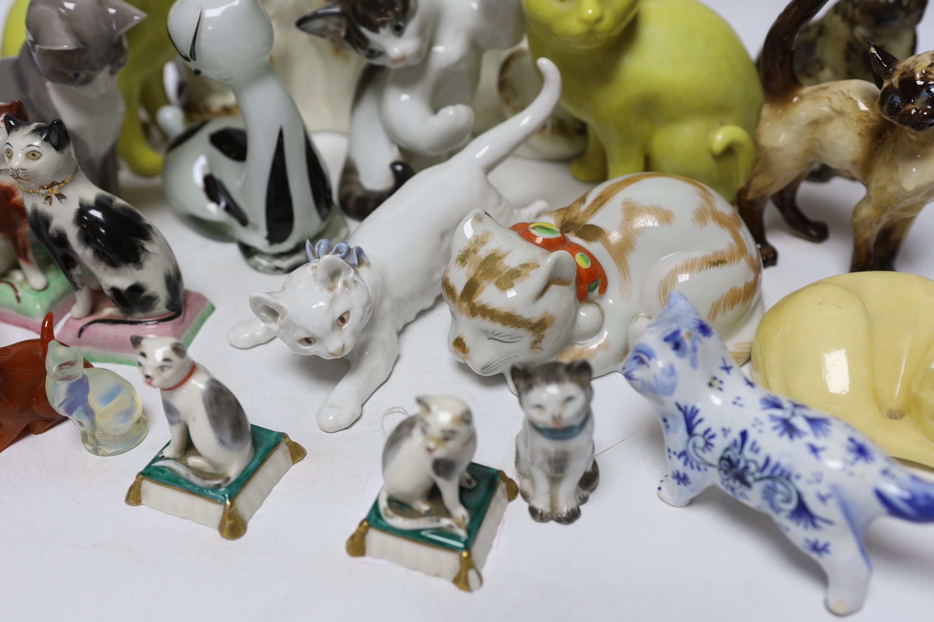 An assortment of various cat ornaments including a Bing and Grundahl example and one Wien example, largest 21cm high